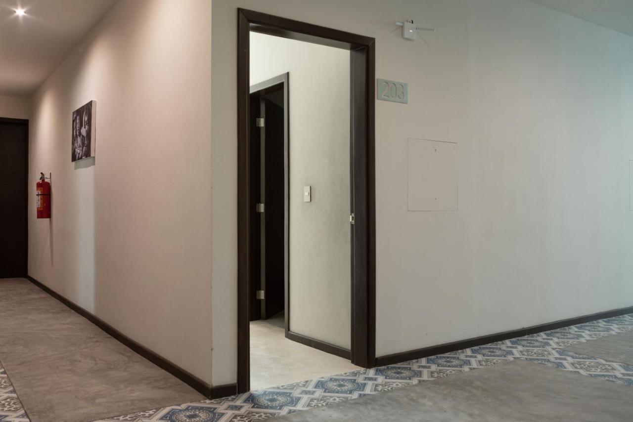 Hotel Mayari Holbox Exteriér fotografie A door opening